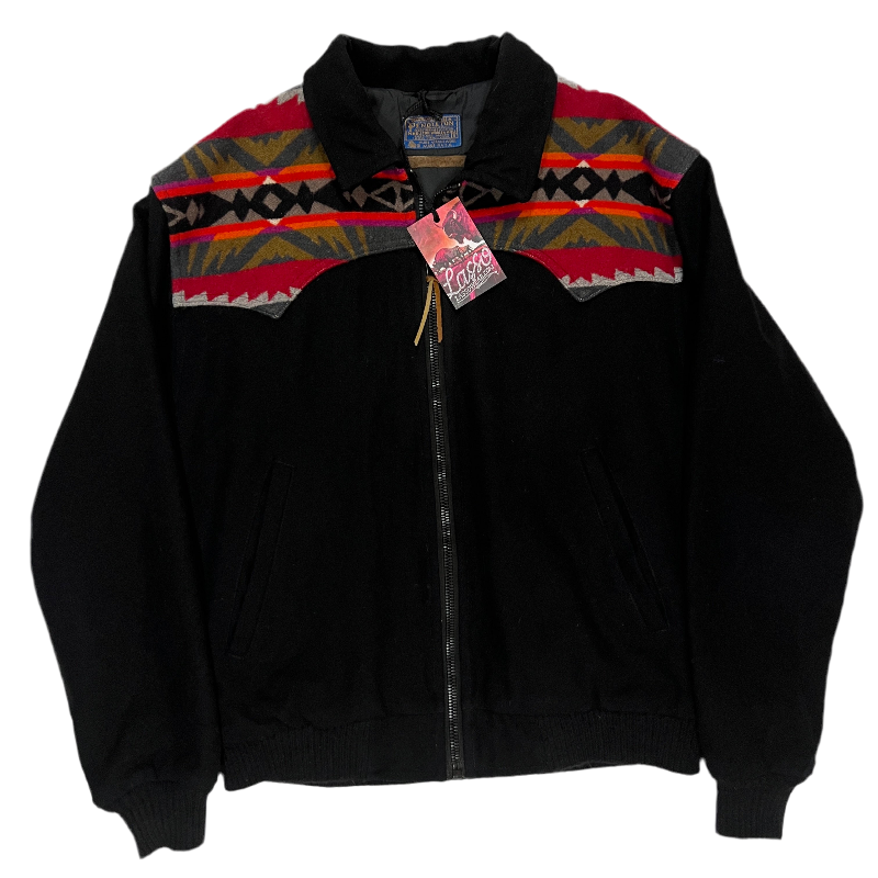 Black jacket with colorful patterned shoulders.