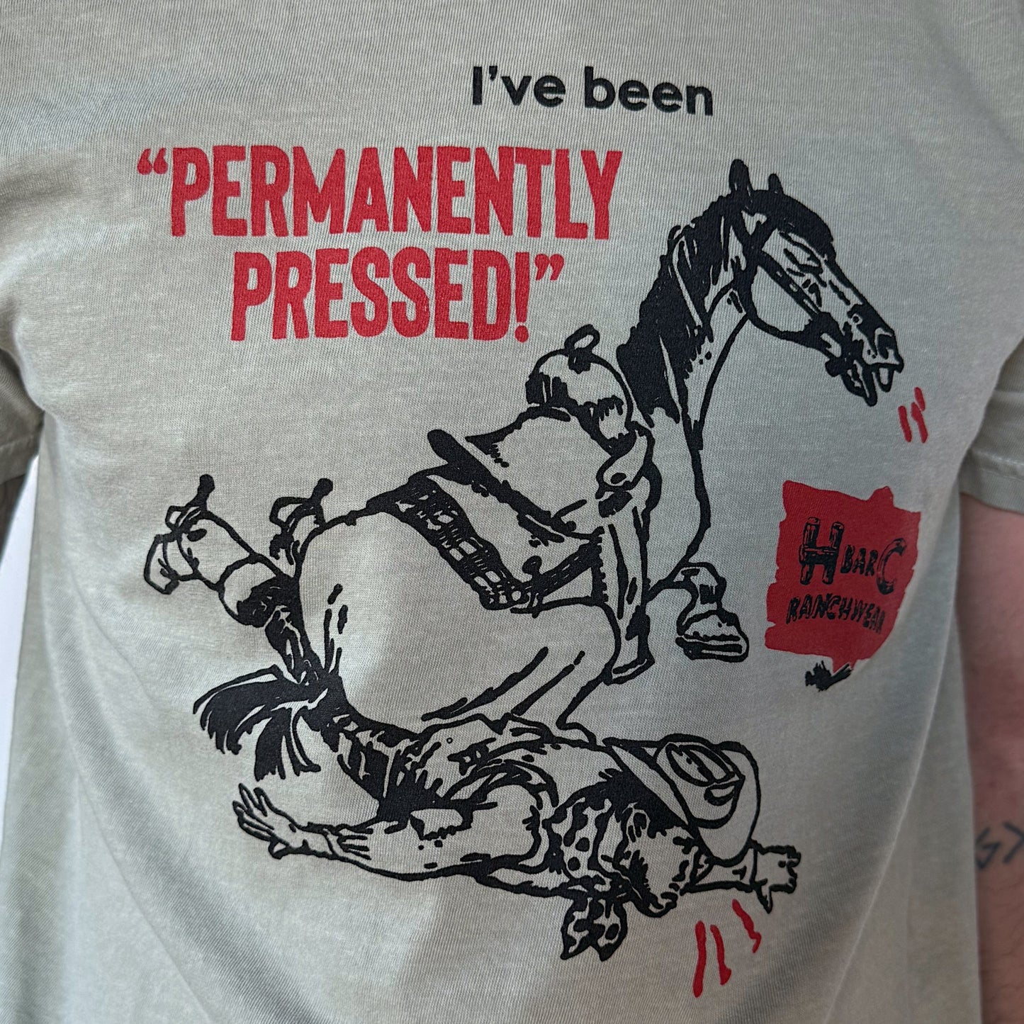 Close-up of H Bar C Permanently Pressed T-Shirt