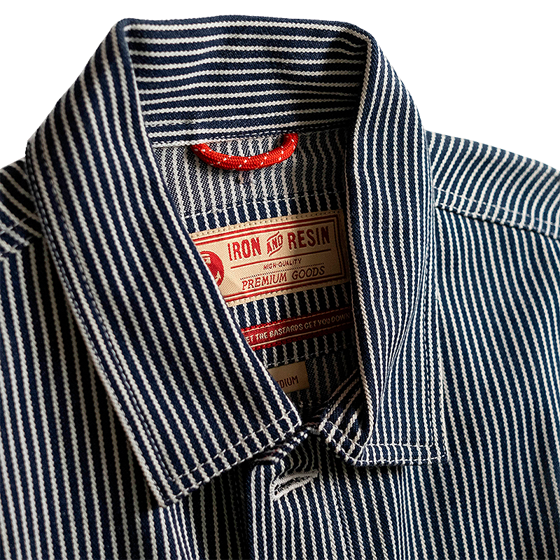 Close-up of a blue and white striped jacket with its brand label