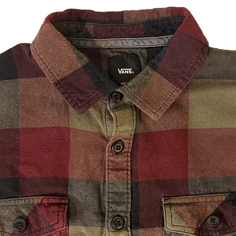 Plaid work shirt with Vans logo on collar tag.