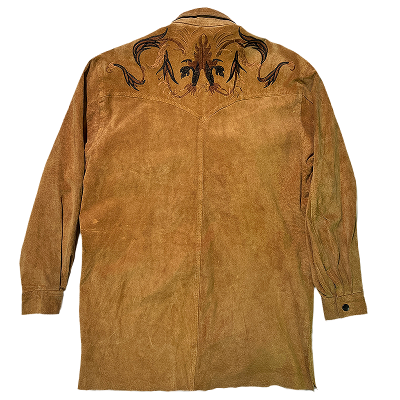 Vintage western leather shirt with embroidery seen from the back.
