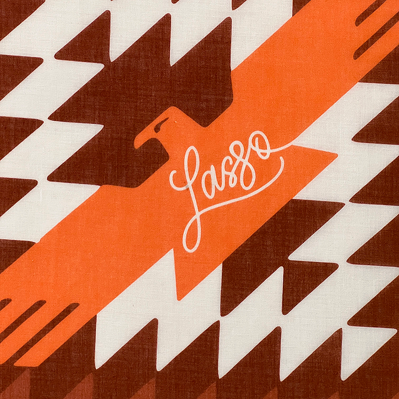 Bandana with geometric pattern and 'Lasso' branding