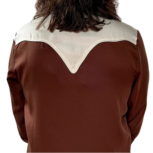Person wearing a brown & white western shirt
