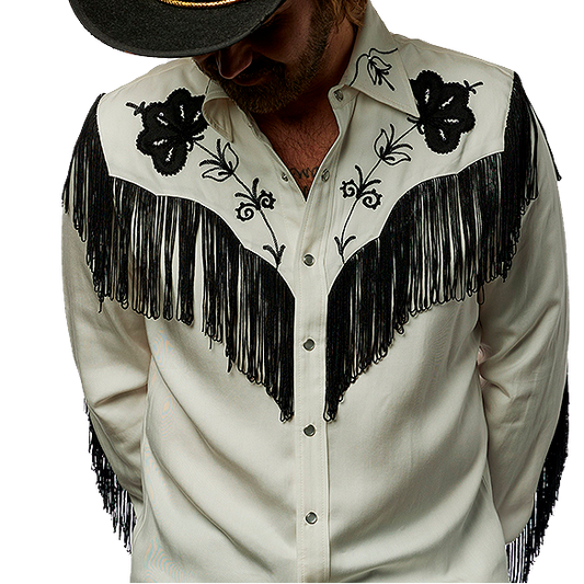 Man wearing a white H Bar C Taos western shirt with black fringe and embroidery, paired with a black cowboy hat