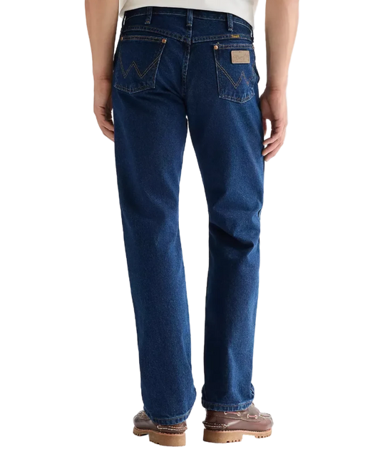 Person wearing blue Wrangler 13MWZ Cowboy Cut jeans.