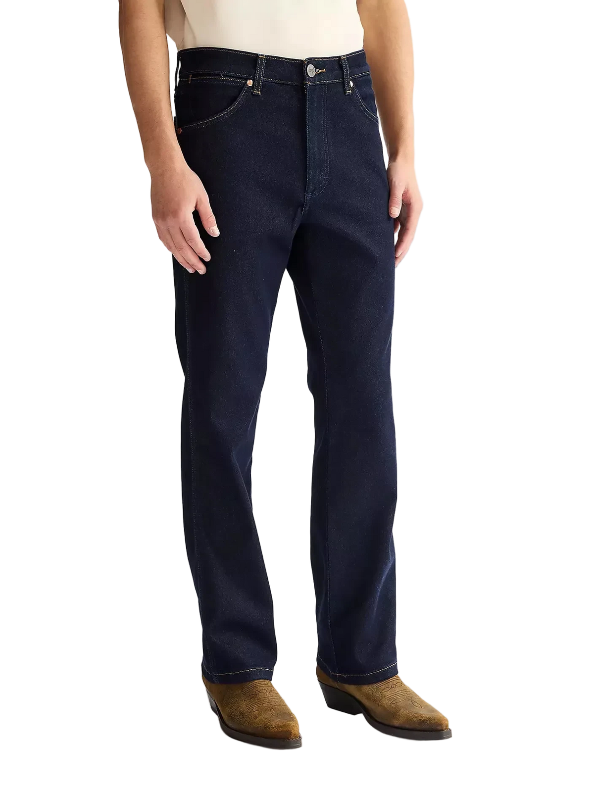 Person wearing dark blue Wrangler jeans and brown boots