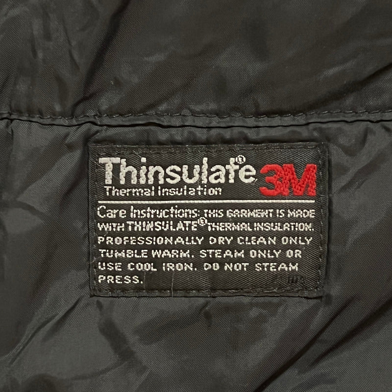 Thinsulate 3M thermal insulation label on a black jacket
