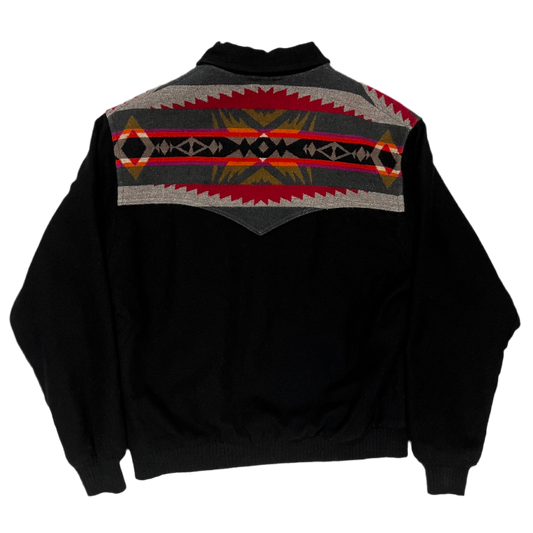 Black jacket with a patterned shoulder.