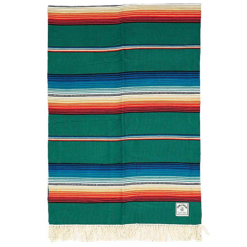 Iron & Resin Del Sol Blanket in green.