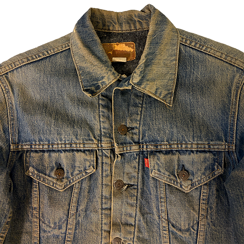 Denim jacket with a brand label