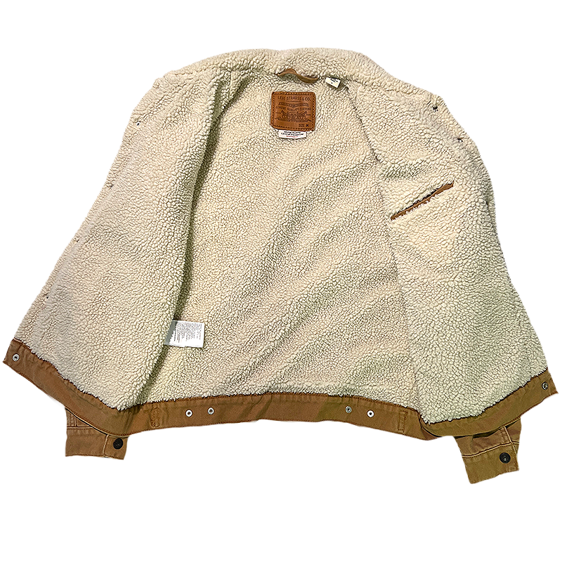 Levi's work jacket spread open, revealing the sherpa lining.