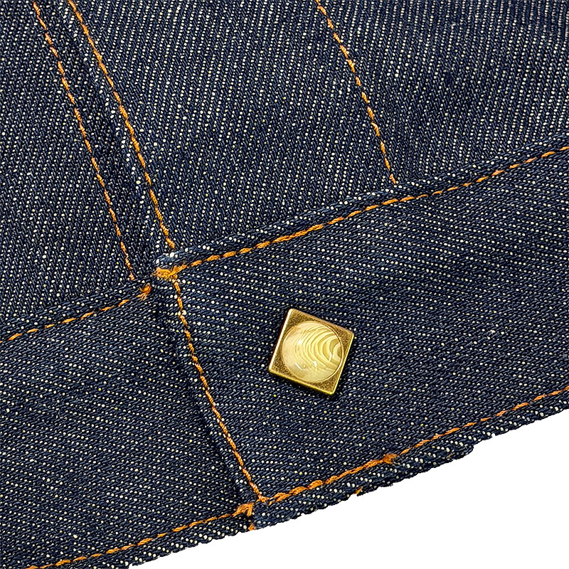 Close-up of a pearl snap button