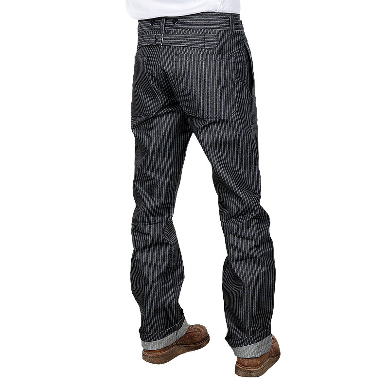 Rear view of a person wearing Pike Brothers 1942 Hunting Pants in Blue Wabash with brown shoes.