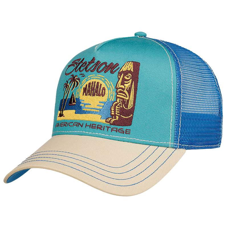 A turquoise and blue Stetson Mahalo Trucker Cap with a beige brim, featuring a Stetson x Mahalo American Heritage graphic on the front.