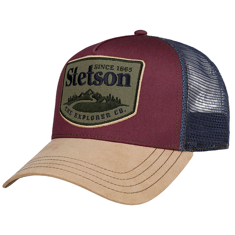 Stetson The Explorer Co. Trucker Cap with a maroon front panel, navy blue mesh back, and a tan curved brim. The front features a large olive green patch with the Stetson logo and mountain graphic.