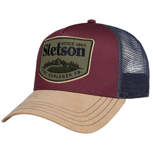 Stetson The Explorer Co. Trucker Cap with a maroon front panel, navy blue mesh back, and a tan curved brim. The front features a large olive green patch with the Stetson logo and mountain graphic.