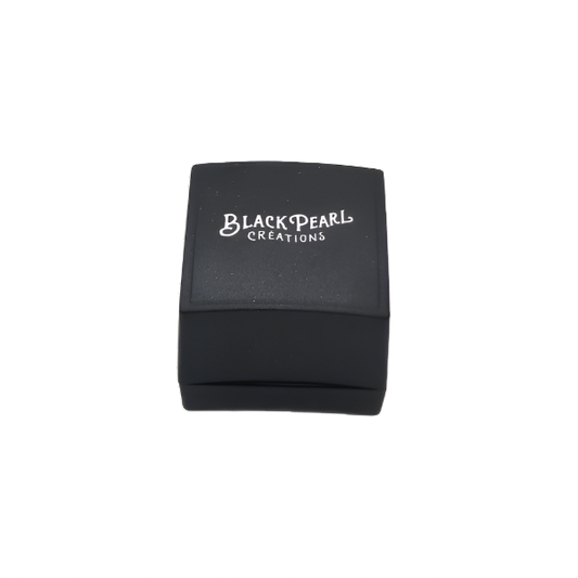 Black jewelry box with 'Black Pearl Creations' logo on a white background