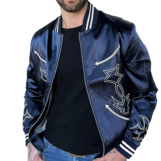 Man wearing a blue H Bar C Odessa Tour Jacket with white designs