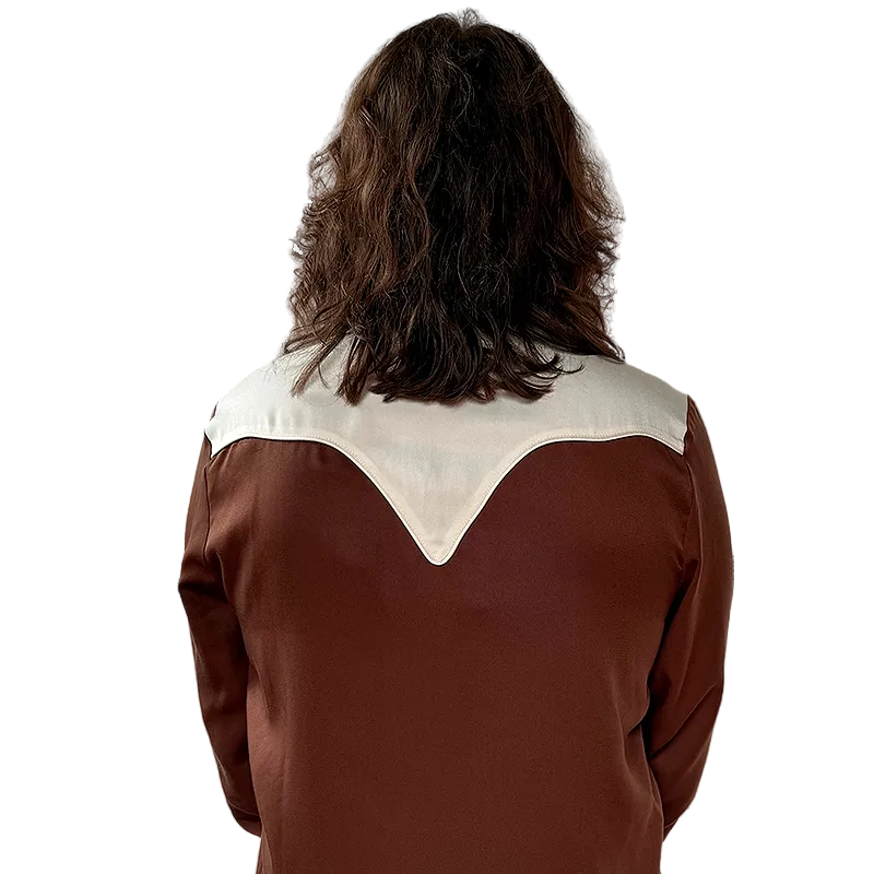Person wearing a brown & white western shirt